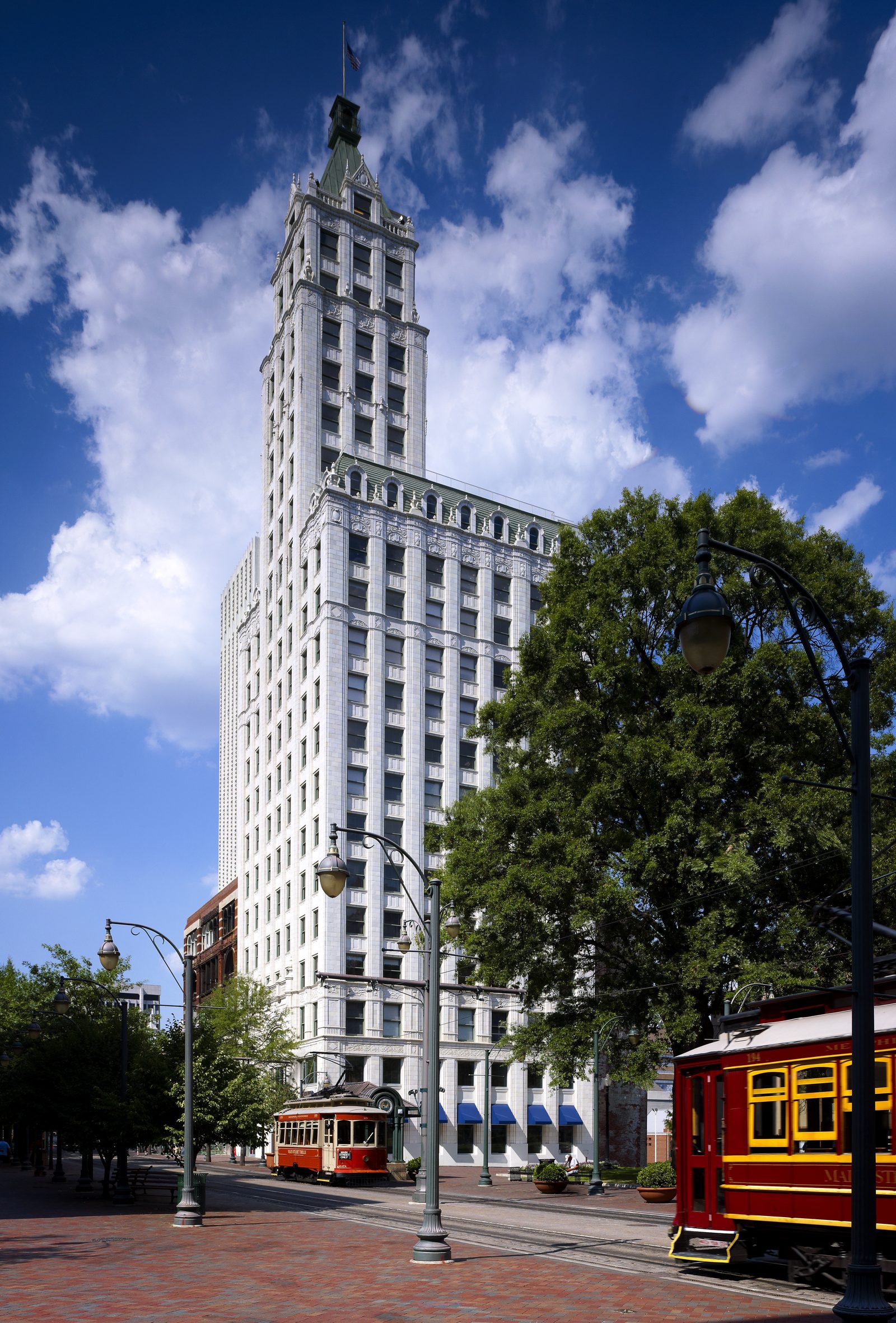 The Columbian Mutual Tower at Court Square Center, Memphis, with a trolley passing.
